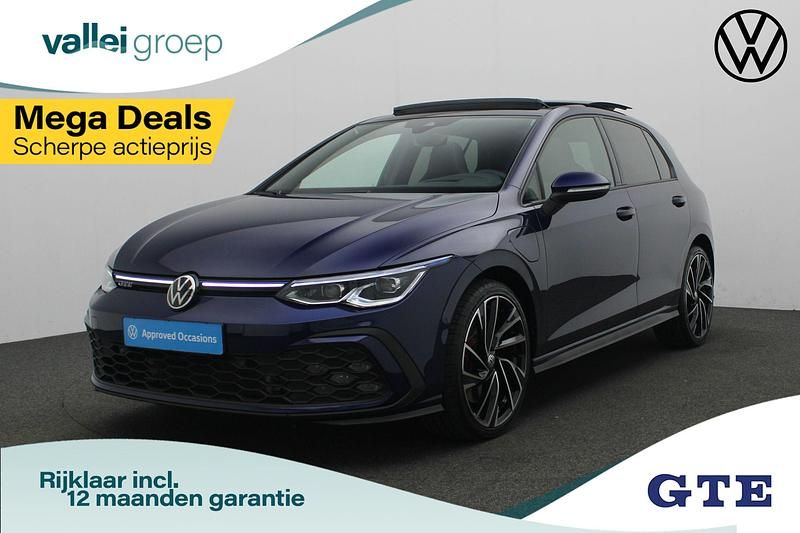 Blauw, metallic lak Gebruikt 2021 VW Golf VIII GTE Hatchback | € 25.900 (Eerlijke prijs) - Afbeelding 1/4