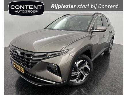 Bruin Gebruikt 2021 Hyundai Tucson Premium SUV | € 29.490 (Eerlijke prijs) - Afbeelding 1/4