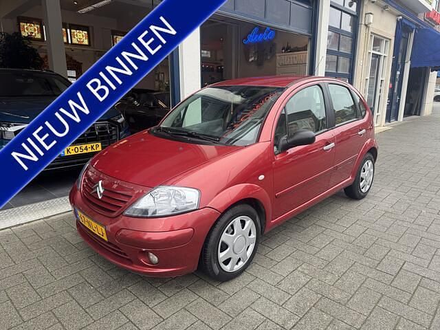 Rood Occasion 2003 Citroën C3 Exclusive Hatchback | € 1.299 (Eerlijke prijs) - Afbeelding 1/4