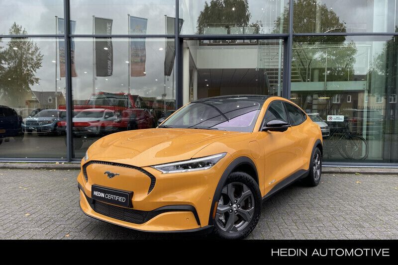 Oranje Gebruikt 2023 Ford Mustang Mach-E SUV | € 34.995 (Eerlijke prijs) - Afbeelding 1/4