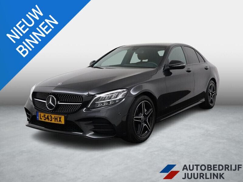 Grijs, metallic lak Gebruikt 2021 Mercedes C180 Business Sedan | € 28.399 (Super prijs) - Afbeelding 1/4