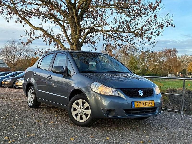 Grijs Gebruikt 2009 Suzuki SX4 Sedan | € 2.975 (Eerlijke prijs) - Afbeelding 1/4