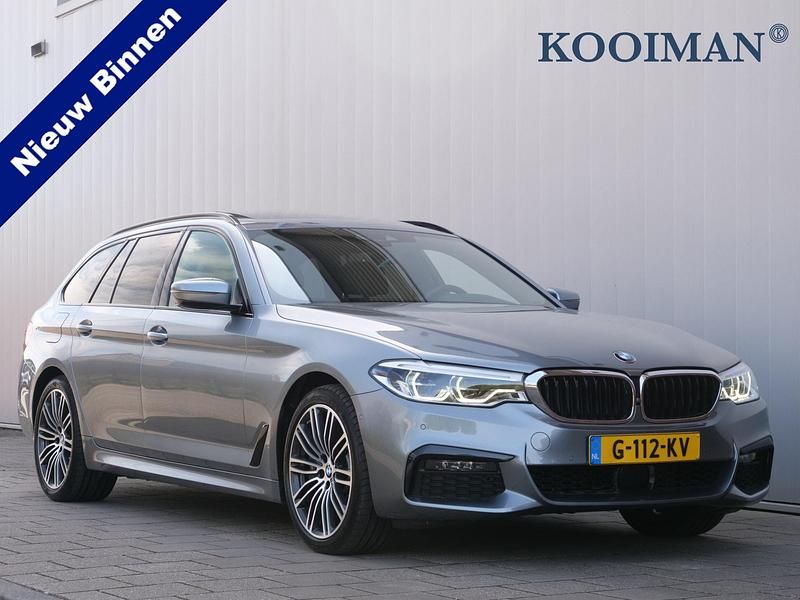 Grijs Gebruikt 2019 BMW 540 Executive Stationwagen | € 41.950 (Goede deal) - Afbeelding 1/4