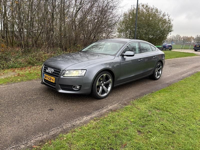 Grijs Gebruikt 2011 Audi A5 Proline Hatchback | € 10.950 (Eerlijke prijs) - Afbeelding 1/4