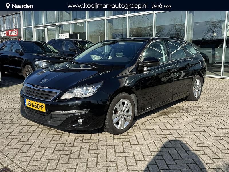 Zwart Gebruikt 2015 Peugeot 308 Premium Stationwagen | € 8.445 (Iets duurder) - Afbeelding 1/4