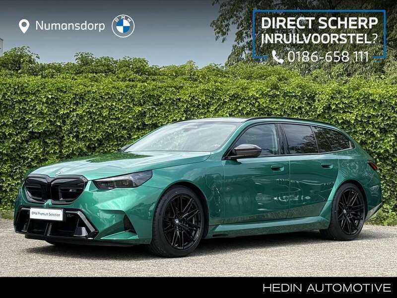 Groen Gebruikt 2024 BMW M5 Comfort Edition Stationwagen | € 144.895 - Afbeelding 1/3