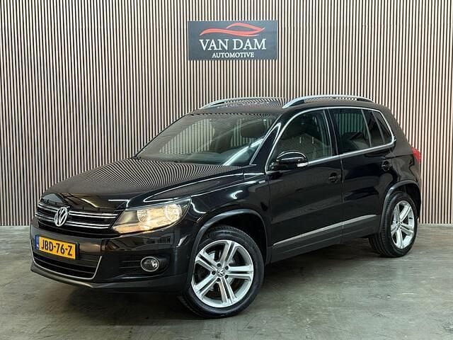 Zwart Gebruikt 2013 VW Tiguan Sport SUV | € 14.400 (Eerlijke prijs) - Afbeelding 1/4