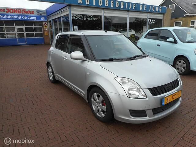 Grijs Gebruikt 2009 Suzuki Swift Hatchback | € 4.295 (Eerlijke prijs) - Afbeelding 1/4