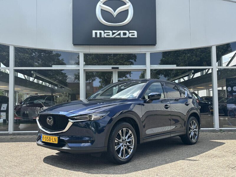 Deep crystal blue Gebruikt 2021 Mazda CX-5 Signature SUV | € 35.450 (Duur) - Afbeelding 1/4