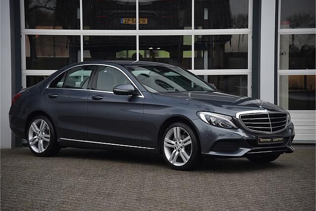 Grijs Occasion 2015 Mercedes C180 Prestige Sedan | € 14.875 (Eerlijke prijs) - Afbeelding 1/4