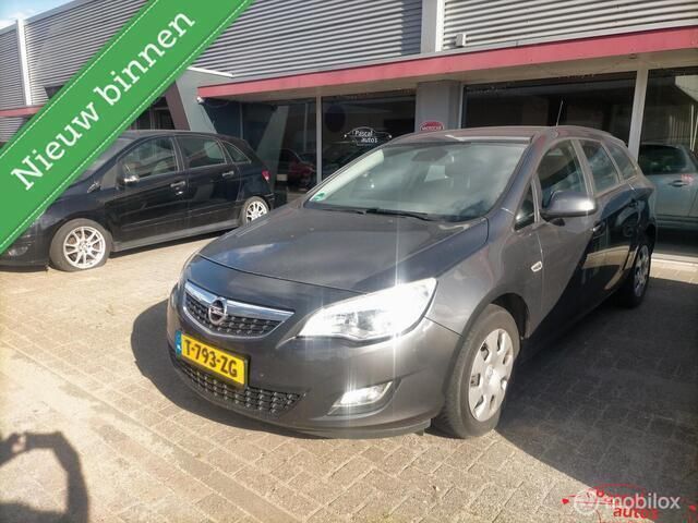 Grijs Gebruikt 2012 Opel Astra Stationwagen | € 1.495 - Afbeelding 1/4