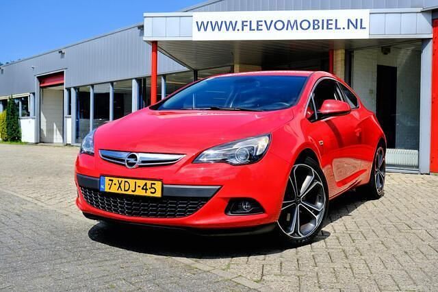 Rood Gebruikt 2014 Opel Astra GTC Sport Hatchback | € 13.450 - Afbeelding 1/4