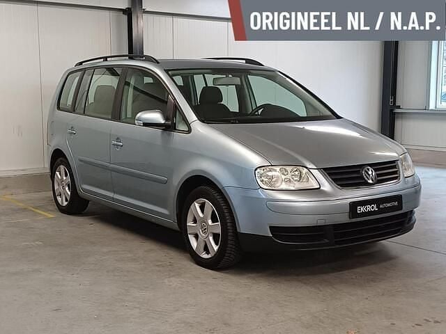 Blauw (metallic) Gebruikt 2006 VW Touran MPV | € 5.450 - Afbeelding 1/3