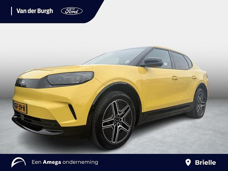 Geel Occasion 2024 Ford Capri Extended Range SUV | € 35.990 (Eerlijke prijs) - Afbeelding 1/4
