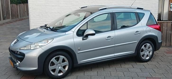 Grijs (metallic) Occasion 2009 Peugeot 207 Outdoor Outdoor Stationwagen | € 1.899 (Eerlijke prijs) - Afbeelding 1/4