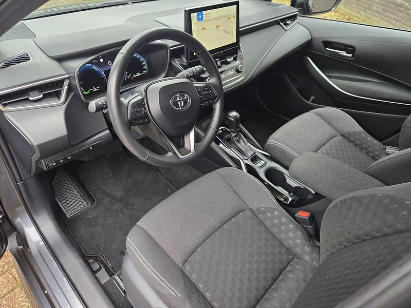 Occasion Toyota Corolla Hybrid Active 140 PK (102 kW) 2024 Grijs Stationwagen