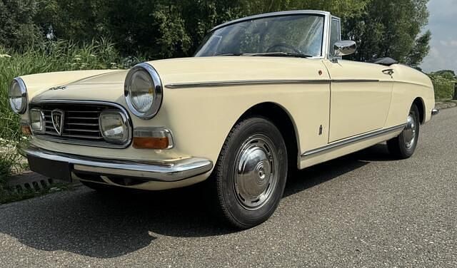 Wit Gebruikt 1968 Peugeot 404 Cabriolet | € 44.000 - Afbeelding 1/4
