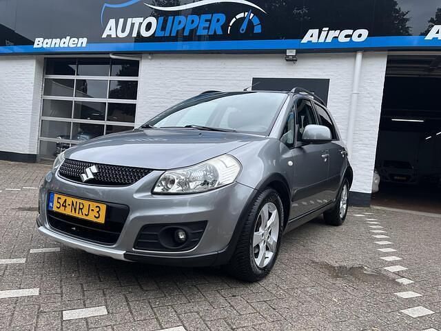 Grijs Gebruikt 2010 Suzuki SX4 Exclusive MPV | € 4.450 (Goede deal) - Afbeelding 1/4