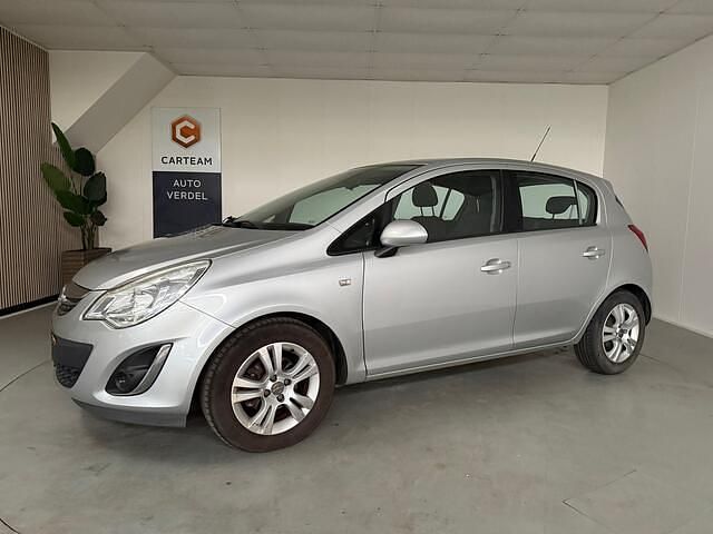 Grijs Gebruikt 2012 Opel Corsa Cosmo Hatchback | € 4.250 (Eerlijke prijs) - Afbeelding 1/4