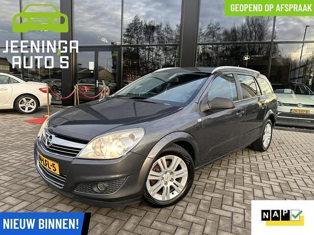 Grijs Gebruikt 2010 Opel Astra Cosmo Stationwagen | € 3.900 (Iets duurder) - Afbeelding 1/4