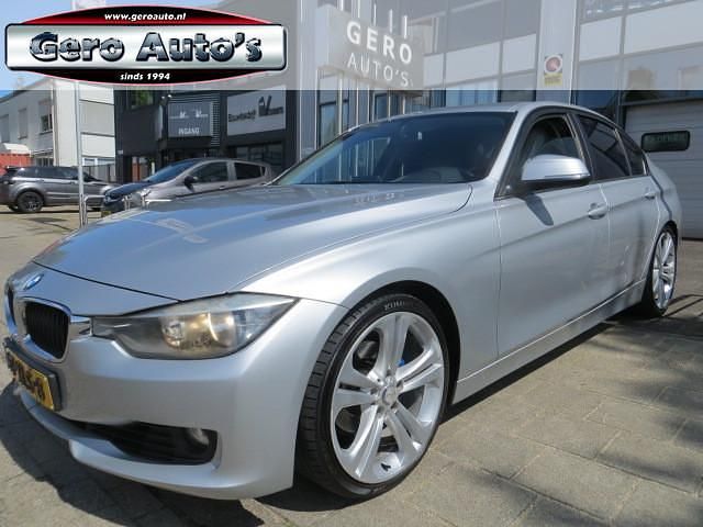 Grijs, metallic lak Occasion 2012 BMW 320 Executive Sedan | € 9.450 (Goede deal) - Afbeelding 1/4