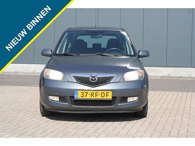 Grijs Occasion 2005 Mazda 2 Touring MPV | € 1.499 (Eerlijke prijs) - Afbeelding 1/4