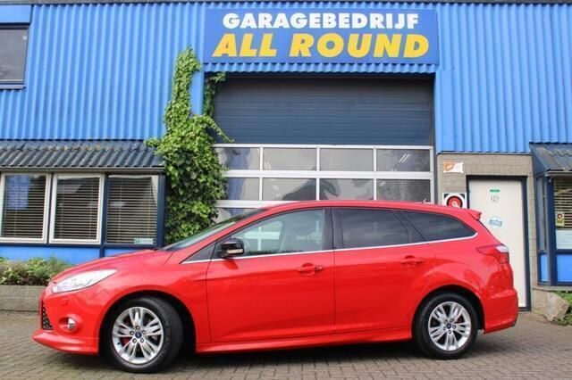 Rood, andere lak Gebruikt 2014 Ford Focus Titanium Stationwagen | € 7.950 (Eerlijke prijs) - Afbeelding 1/4