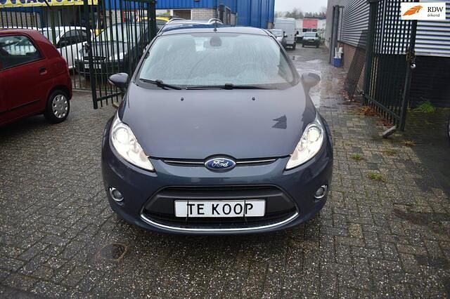 Grijs Gebruikt 2012 Ford Fiesta Titanium Hatchback | € 2.450 (Goede deal) - Afbeelding 1/4