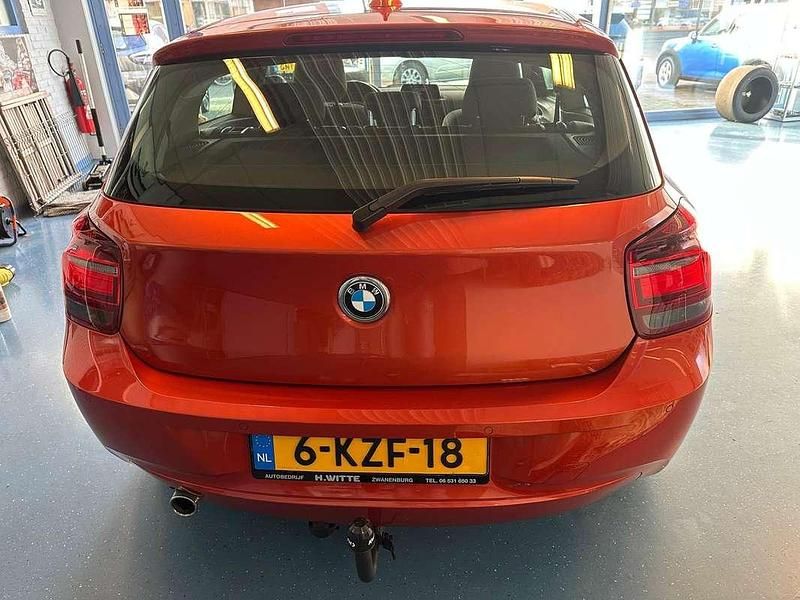 Occasion BMW 116 Executive 136 PK (100 kW) 2013 Oranje Hatchback
