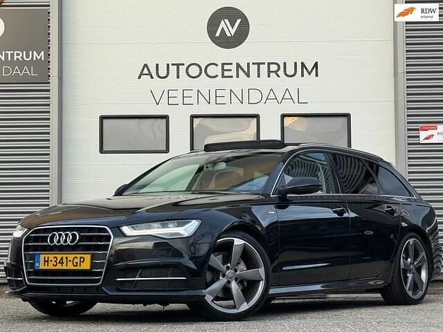 Zwart (metallic) Gebruikt 2017 Audi A6 S-Line Stationwagen | € 22.500 (Goede deal) - Afbeelding 1/4