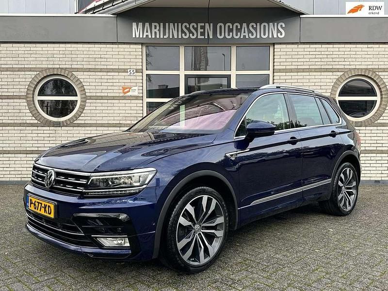 Blauw Gebruikt 2016 VW Tiguan Highline SUV | € 21.950 (Eerlijke prijs) - Afbeelding 1/4