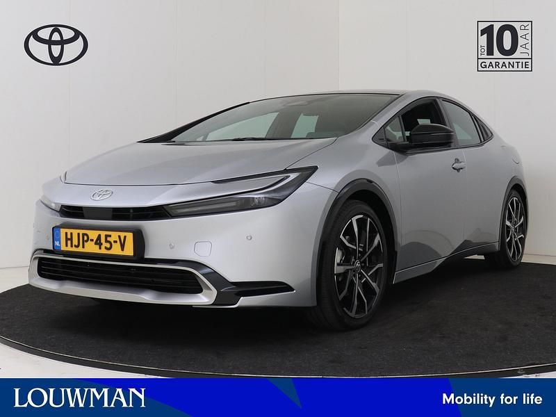 Grijs metallic Gebruikt 2025 Toyota Prius Executive Hatchback | € 41.870 (Eerlijke prijs) - Afbeelding 1/3