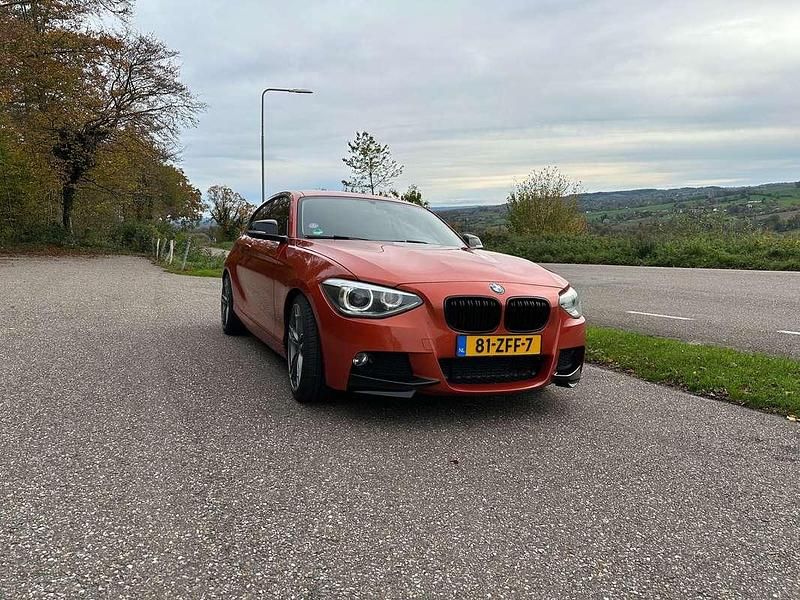 Oranje Gebruikt 2012 BMW 116 M Sport Hatchback | € 7.450 (Super prijs) - Afbeelding 1/4