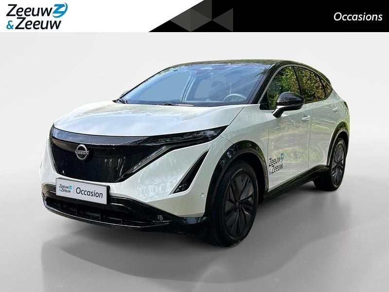 Twotone (white pearl/black) Occasion 2025 Nissan Ariya SUV | € 35.935 (Goede deal) - Afbeelding 1/4