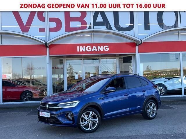 Blauw, metallic lak Gebruikt 2023 VW Taigo R-line SUV | € 25.750 (Super prijs) - Afbeelding 1/4