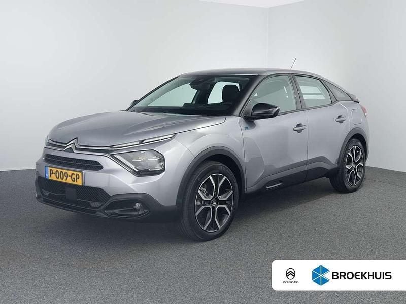 Grijs, metallic lak Gebruikt 2022 Citroën e-C4 Feel SUV | € 13.900 (Super prijs) - Afbeelding 1/4