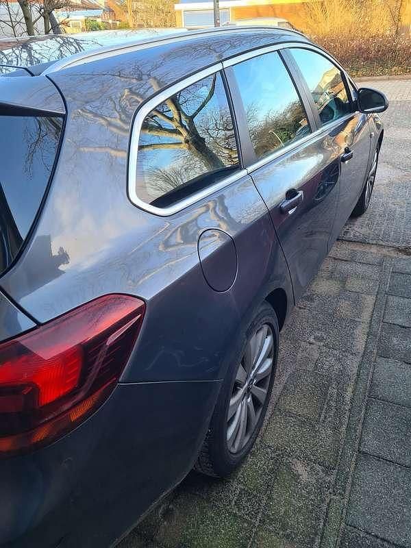 Occasion Opel Astra Cosmo 101 PK (74 kW) 2011 Grijs Stationwagen