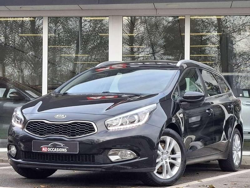 Zwart (metallic) Gebruikt 2015 Kia Ceed Sportswagon Stationwagen | € 10.499 (Eerlijke prijs) - Afbeelding 1/4