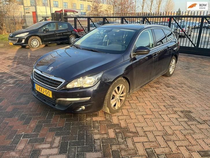 Blauw (metallic) Occasion 2014 Peugeot 308 SW Stationwagen | € 4.222 (Iets duurder) - Afbeelding 1/4