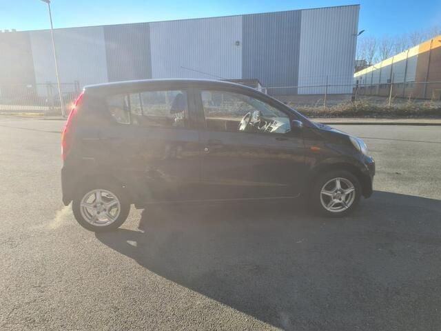 Occasion Daihatsu Cuore 69 PK (50 kW) 2008 Zwart, metallic lak Hatchback