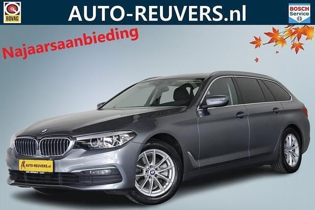 Grijs (metallic) Gebruikt 2020 BMW 520 Stationwagen | € 29.900 (Goede deal) - Afbeelding 1/4