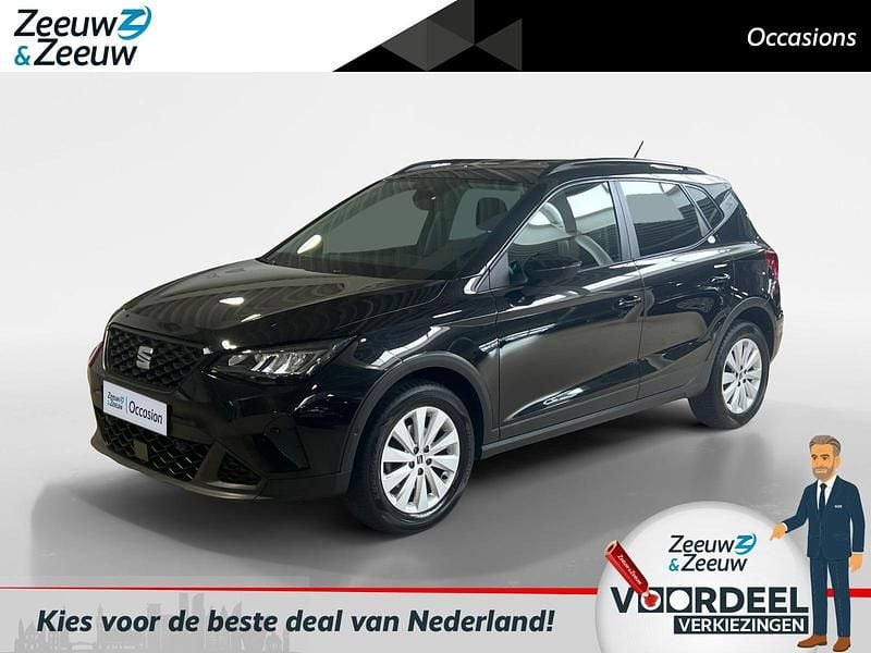 Metallic mythical black (0e) Gebruikt 2023 Seat Arona Business SUV | € 16.645 (Goede deal) - Afbeelding 1/3