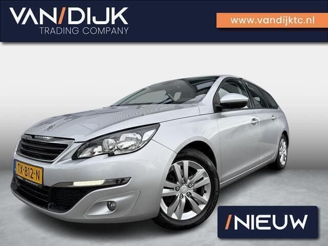Grijs, metallic lak Gebruikt 2014 Peugeot 308 Active Stationwagen | € 3.990 (Eerlijke prijs) - Afbeelding 1/4