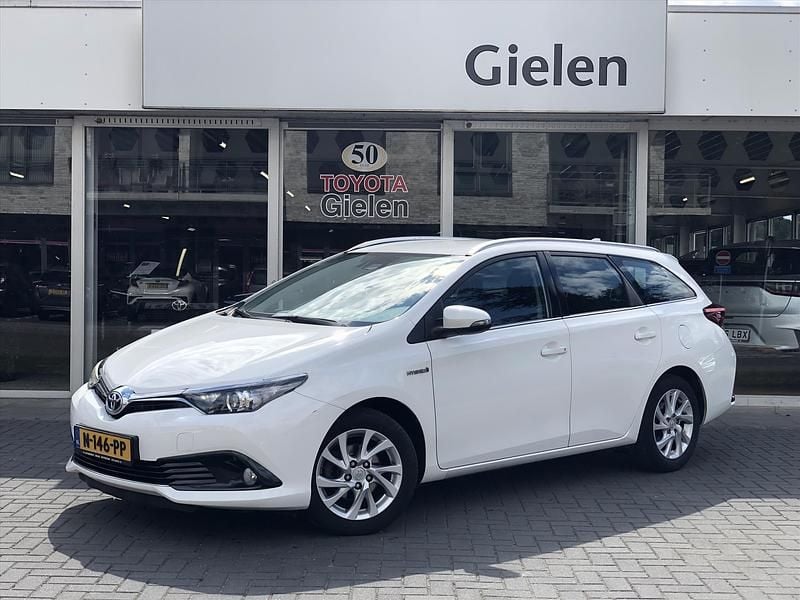 Wit Gebruikt 2018 Toyota Auris Hybrid Hatchback | € 14.900 (Eerlijke prijs) - Afbeelding 1/4