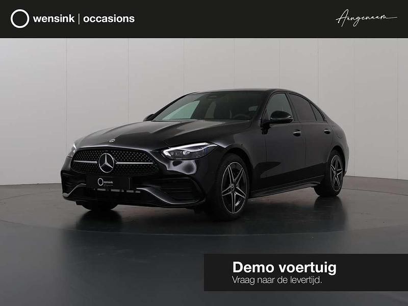 Zwart, metallic lak Gebruikt 2025 Mercedes C300e AMG line Sedan | € 57.850 (Eerlijke prijs) - Afbeelding 1/4