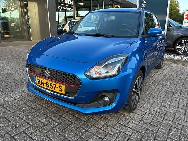 Blauw Gebruikt 2018 Suzuki Swift Hatchback | € 10.950 (Goede deal) - Afbeelding 1/4