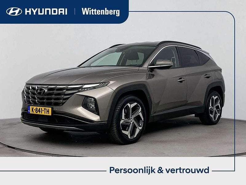 Silky bronze metallic (b6s) Occasion 2021 Hyundai Tucson Comfort SUV | € 22.899 (Eerlijke prijs) - Afbeelding 1/3