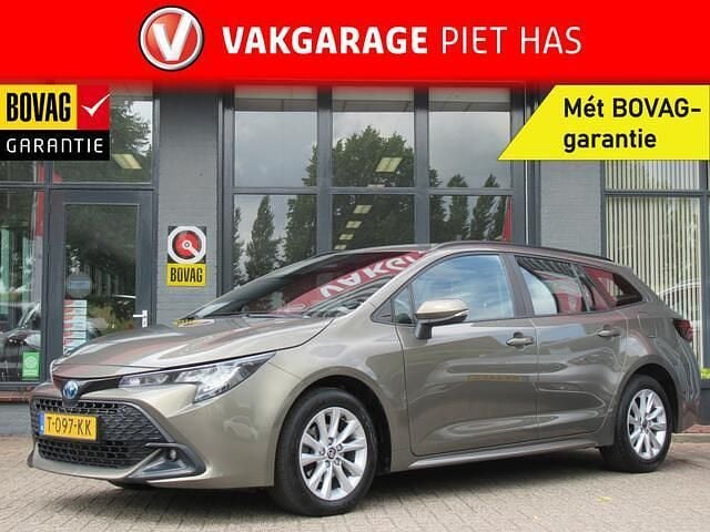 Bruin Gebruikt 2023 Toyota Corolla Active Stationwagen | € 20.900 (Eerlijke prijs) - Afbeelding 1/4