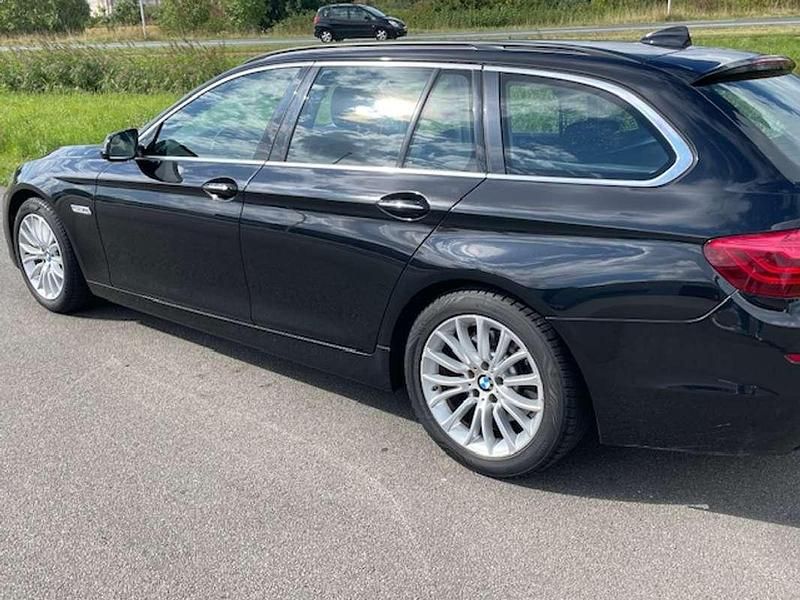 Occasion BMW 520 Executive 190 PK (139 kW) 2015 Zwart Stationwagen