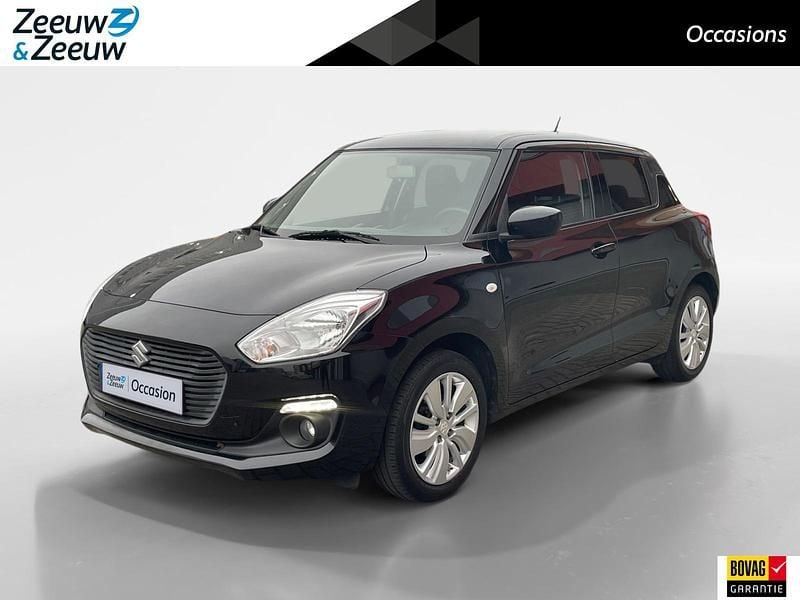 Zwart Occasion 2018 Suzuki Swift Hatchback | € 13.200 (Eerlijke prijs) - Afbeelding 1/4